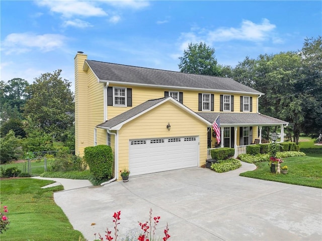 1083 Wash Lee Dr SW, Lilburn, GA 30047 - view of front of house with covered porch, driveway, a chimney, and a garage