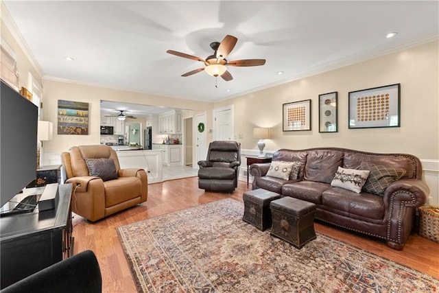 1083 Wash Lee Dr SW, Lilburn, GA 30047 - living room featuring ceiling fan, crown molding, light wood-style flooring, and recessed lighting