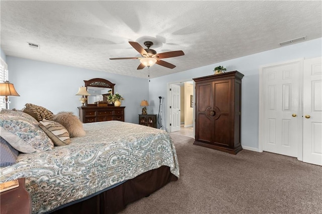 1083 Wash Lee Dr SW, Lilburn, GA 30047 - bedroom featuring carpet floors, a textured ceiling, and ceiling fan
