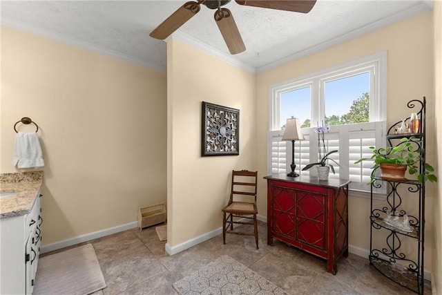 1083 Wash Lee Dr SW, Lilburn, GA 30047 - living area featuring a ceiling fan, ornamental molding, and a textured ceiling