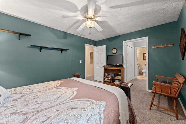 1083 Wash Lee Dr SW, Lilburn, GA 30047 - carpeted bedroom featuring connected bathroom and a ceiling fan