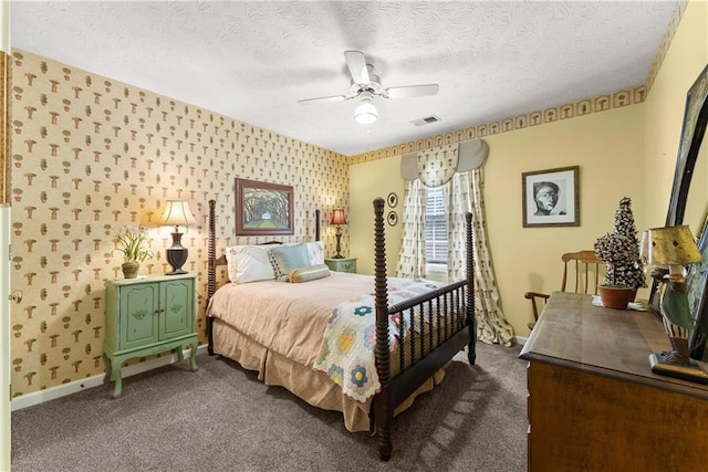 1083 Wash Lee Dr SW, Lilburn, GA 30047 - bedroom featuring wallpapered walls, dark colored carpet, a textured ceiling, and a ceiling fan