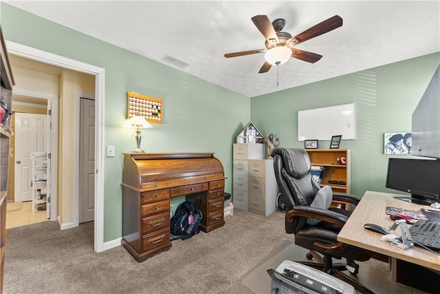 1083 Wash Lee Dr SW, Lilburn, GA 30047 - home office with ceiling fan, carpet floors, and a textured ceiling