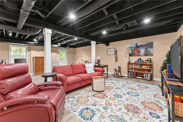 1083 Wash Lee Dr SW, Lilburn, GA 30047 - living area featuring wood finished floors and baseboards