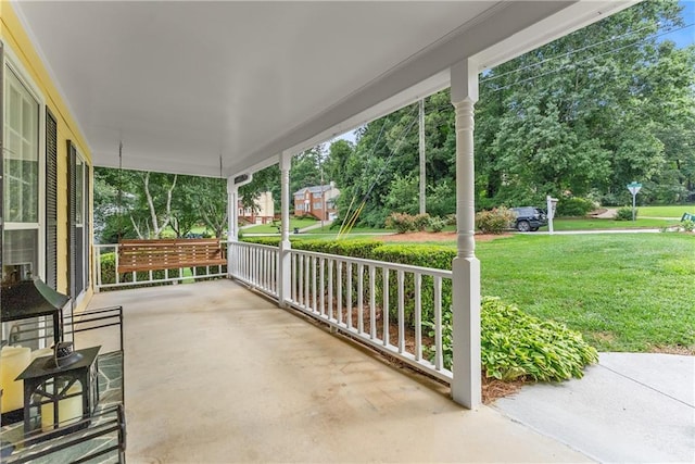 1083 Wash Lee Dr SW, Lilburn, GA 30047 - porch featuring a lawn and view of scattered trees