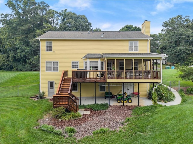 1083 Wash Lee Dr SW, Lilburn, GA 30047 - back of property featuring a patio, stairs, a wooden deck, a chimney, and a fenced backyard