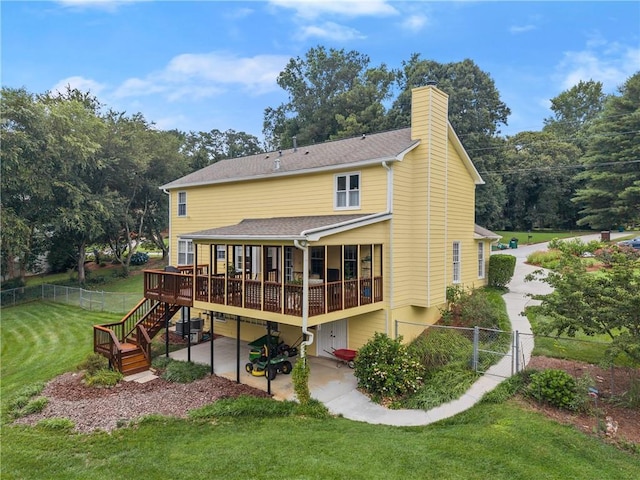 1083 Wash Lee Dr SW, Lilburn, GA 30047 - rear view of house with a patio area, a wooden deck, stairway, a fenced backyard, and a chimney
