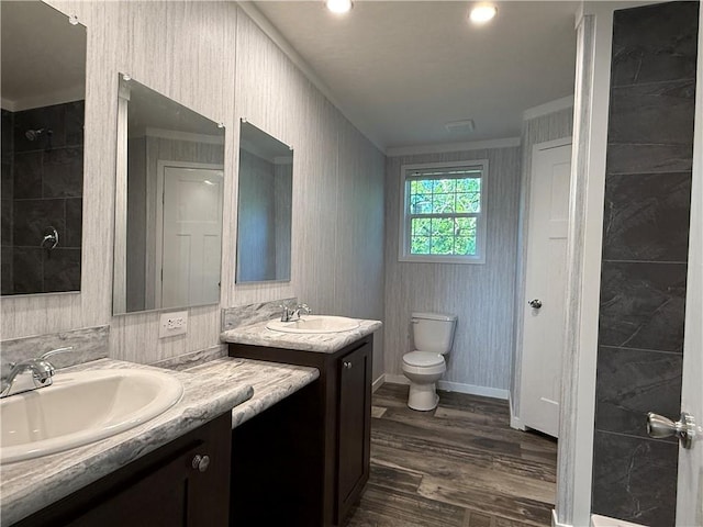 5251 Bogus Rd, Gainesville, GA 30506 - bathroom with crown molding, two vanities, wood finished floors, and a tile shower