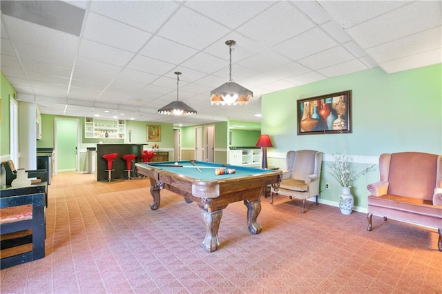 game room featuring pool table, baseboards, a drop ceiling, and a dry bar