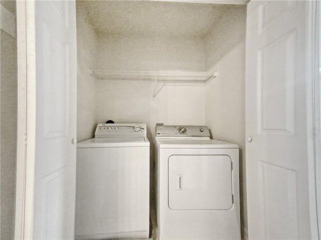 empty room with ceiling fan, carpet floors, and a textured ceiling