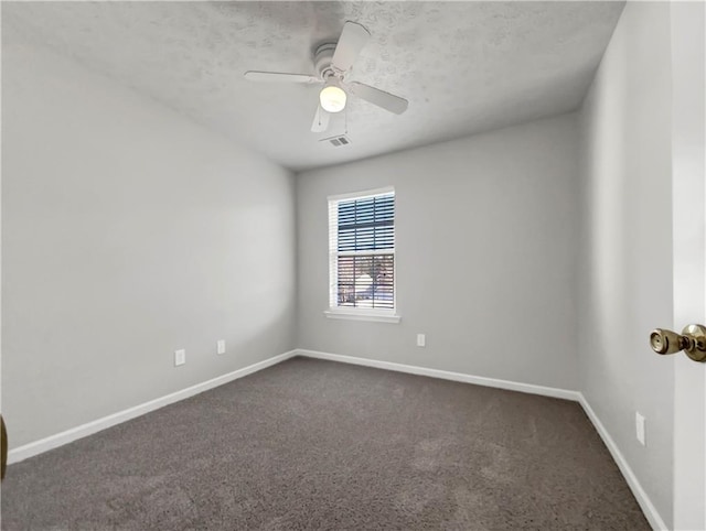 spare room with lofted ceiling, ceiling fan, and carpet floors