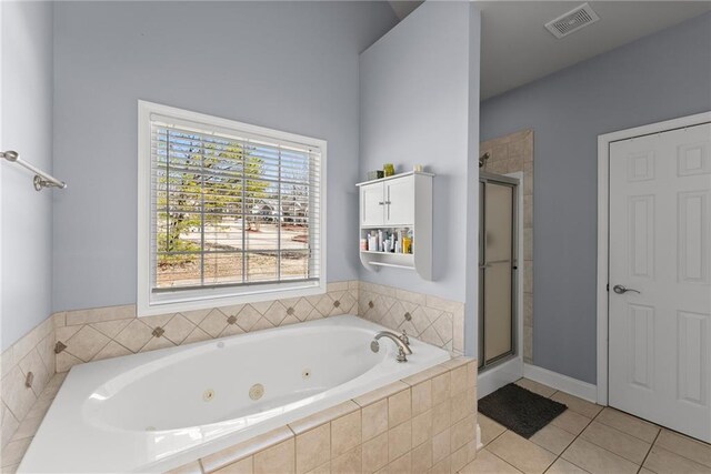 full bath with a shower stall, visible vents, a tub with jets, and tile patterned flooring