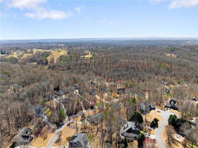 bird's eye view with a forest view