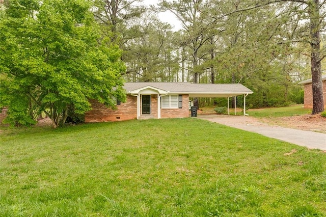 single story home with driveway, a front yard, an attached carport, and brick siding
