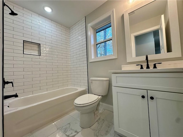 bathroom featuring baseboards, toilet, shower / bathtub combination, marble finish floor, and vanity