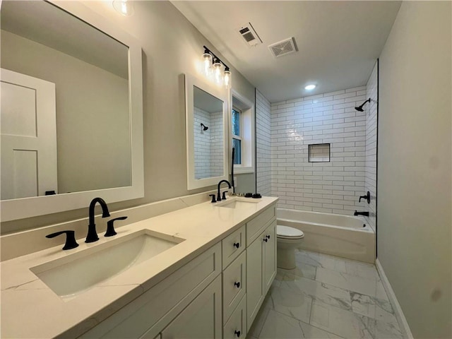 full bathroom featuring toilet, visible vents, marble finish floor, and a sink