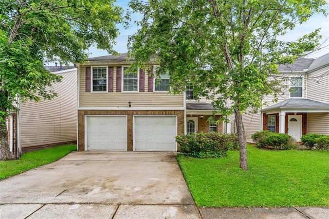 5865 El Segundo Way, Atlanta, GA 30349 - view of front of house featuring concrete driveway, brick siding, a garage, and a front yard