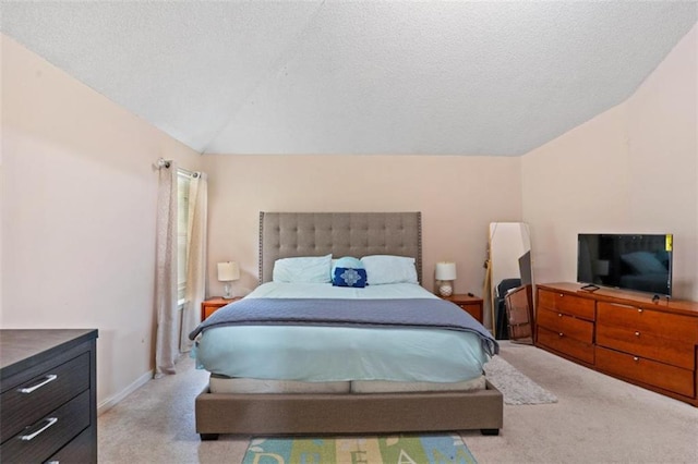 5865 El Segundo Way, Atlanta, GA 30349 - bedroom with carpet flooring, vaulted ceiling, and a textured ceiling