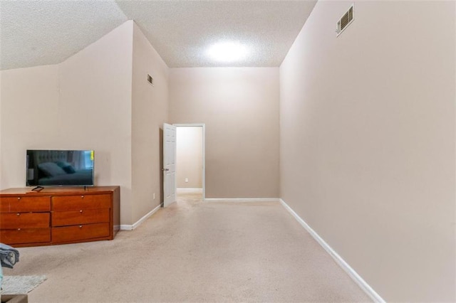 5865 El Segundo Way, Atlanta, GA 30349 - unfurnished living room with a textured ceiling and light carpet
