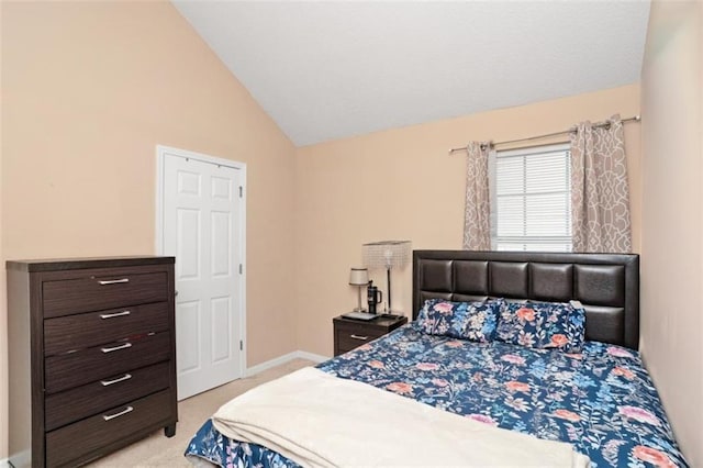 5865 El Segundo Way, Atlanta, GA 30349 - bedroom with light colored carpet and vaulted ceiling