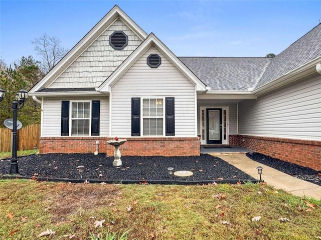 view of front of home with a front lawn