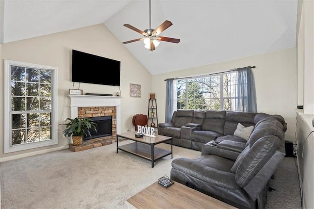 living area featuring high vaulted ceiling, carpet, a ceiling fan, and a brick fireplace