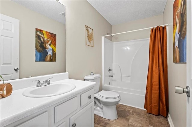 full bath featuring toilet, a textured ceiling, vanity, and shower / bath combo with shower curtain