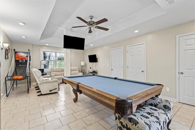 game room featuring light tile patterned floors, billiards, baseboards, a raised ceiling, and a ceiling fan