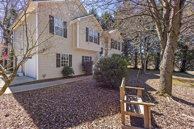 view of home's exterior with a garage