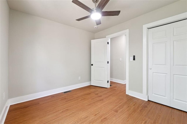 2081 Verbena St NW, Atlanta, GA 30314 - unfurnished bedroom featuring light wood-style flooring, a closet, and ceiling fan