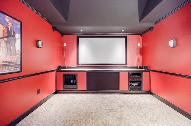 carpeted home theater room with beverage cooler