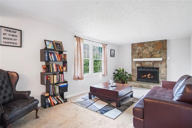 carpeted living room with a textured ceiling and a stone fireplace