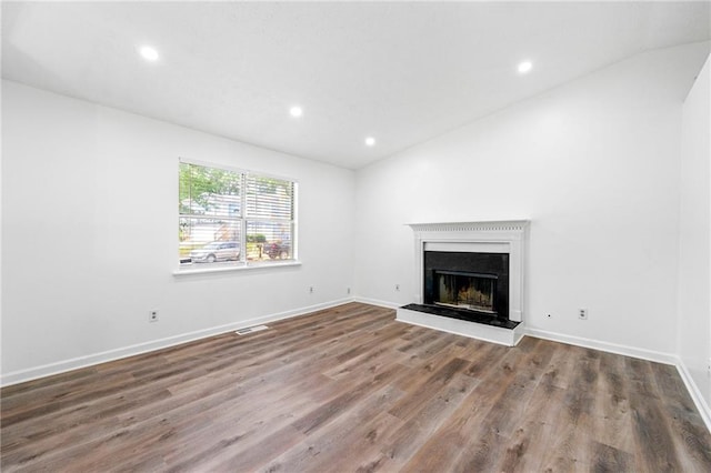 unfurnished living room featuring hardwood / wood-style floors