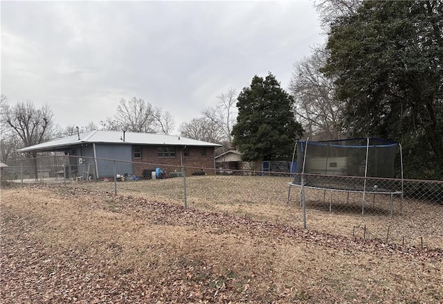 view of yard featuring a trampoline