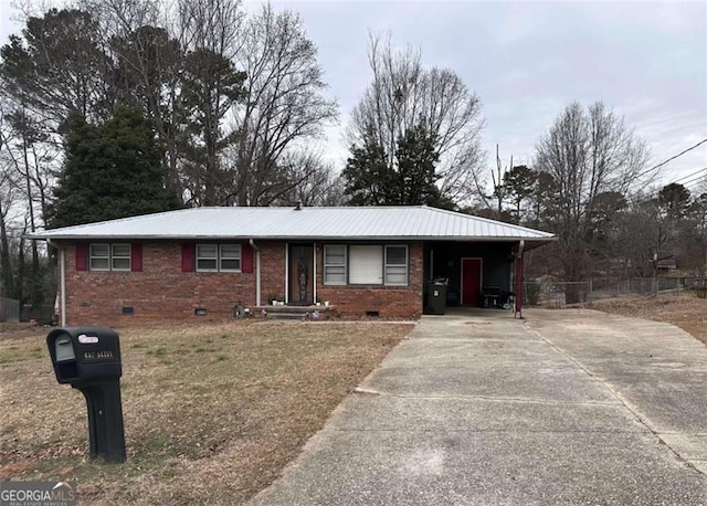 ranch-style home with a carport