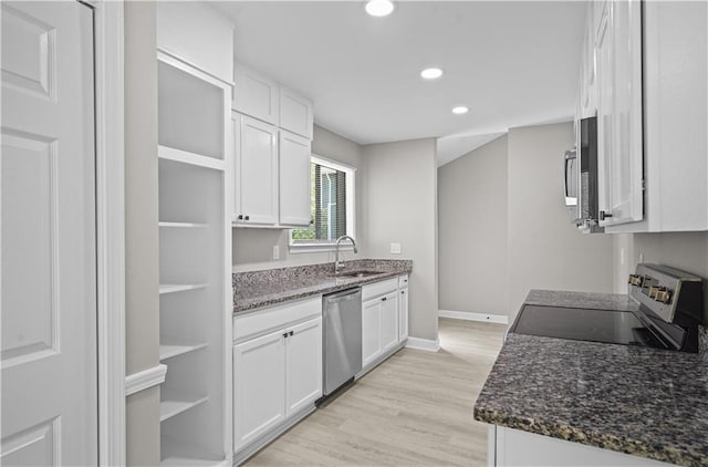 1819 Laurel Ridge Dr SW, Conyers, GA 30094 - kitchen with open shelves, stainless steel appliances, a sink, white cabinets, and light wood finished floors