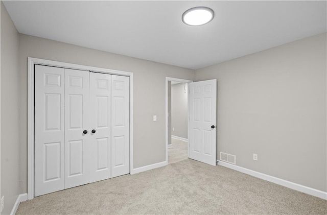 1819 Laurel Ridge Dr SW, Conyers, GA 30094 - unfurnished bedroom featuring carpet floors, baseboards, and a closet