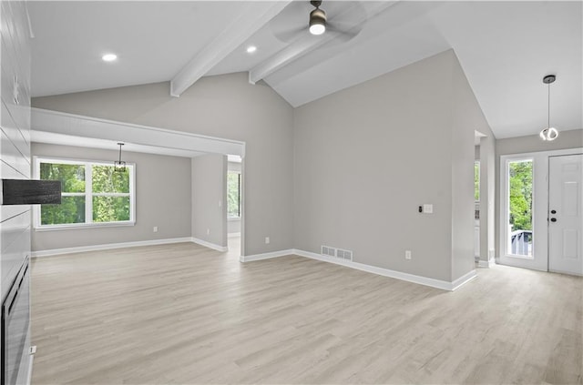 1819 Laurel Ridge Dr SW, Conyers, GA 30094 - unfurnished living room featuring ceiling fan, beamed ceiling, baseboards, light wood-style flooring, and recessed lighting