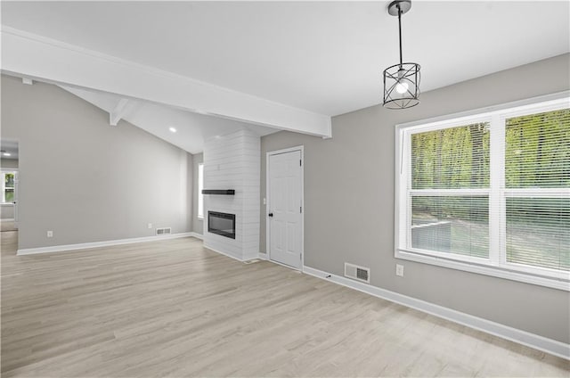 1819 Laurel Ridge Dr SW, Conyers, GA 30094 - unfurnished living room with light wood finished floors, baseboards, a large fireplace, and recessed lighting