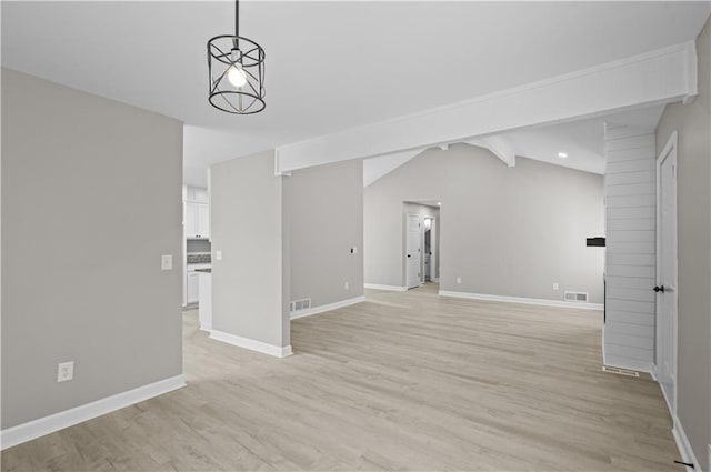 1819 Laurel Ridge Dr SW, Conyers, GA 30094 - unfurnished living room with light wood finished floors, baseboards, and vaulted ceiling