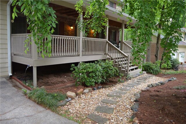 view of property exterior with a porch