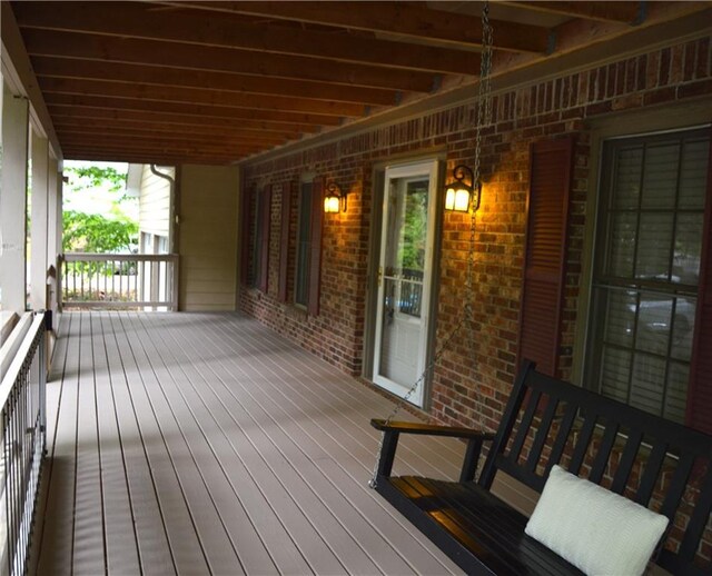 deck featuring covered porch