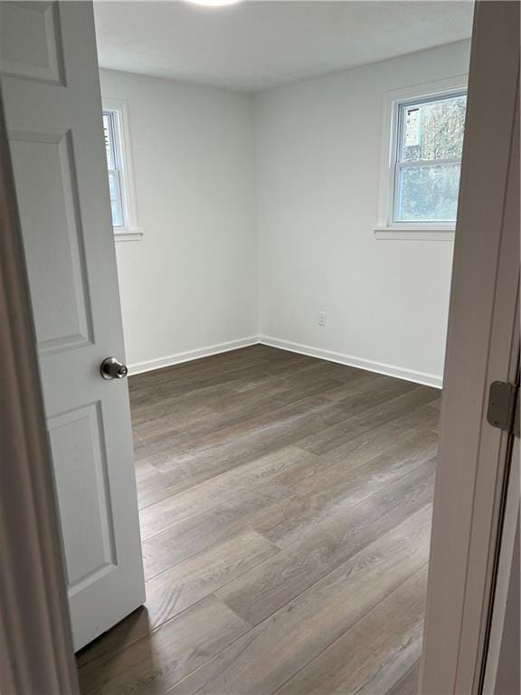 empty room with light wood-type flooring