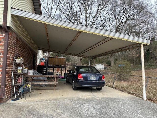 2195 Wilson Rd, Conyers, GA 30012 - view of car parking featuring fence and a carport