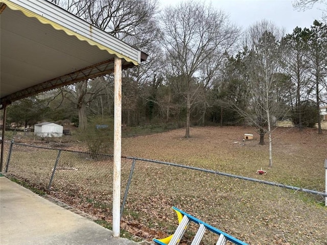 2195 Wilson Rd, Conyers, GA 30012 - fenced yard featuring view of scattered trees
