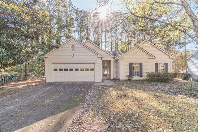 single story home with a garage