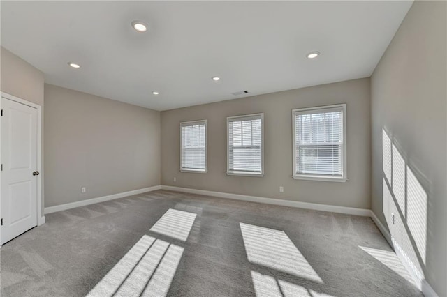 view of carpeted spare room