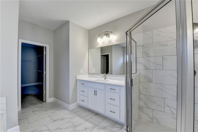 bathroom featuring vanity and an enclosed shower