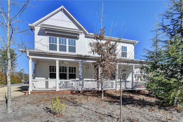 view of front of house with ceiling fan and covered porch