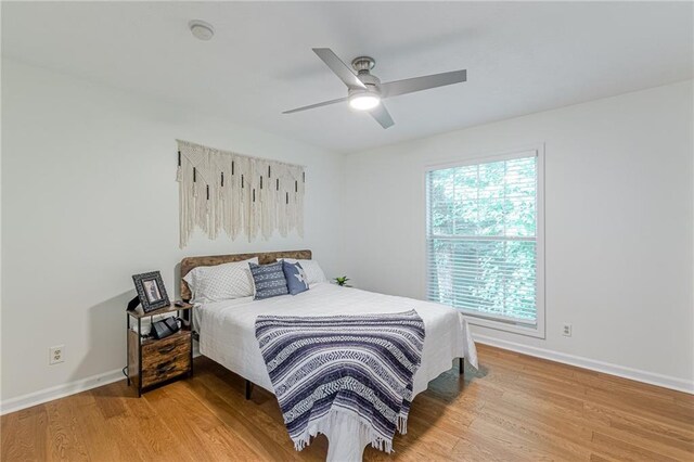 3135 Seven Pines Ct Unit 201, Atlanta, GA 30339 - bedroom with wood finished floors and a ceiling fan